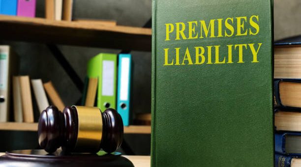 a gavel and book with 'premises liability' on the cover
